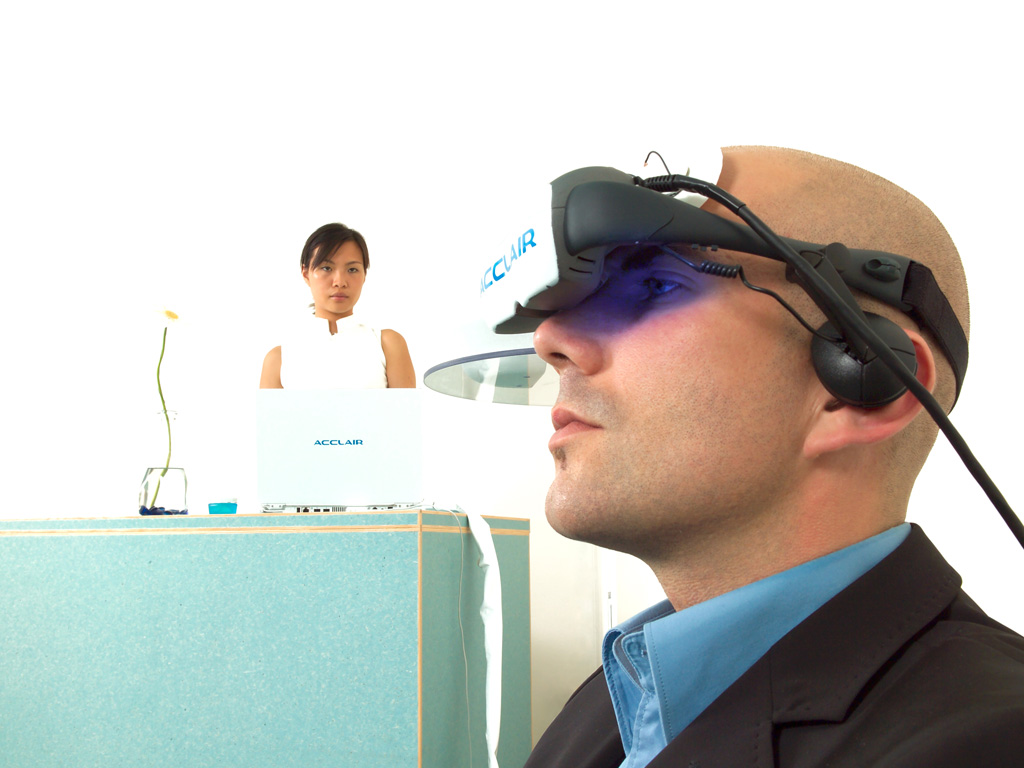 Acclair: User wears head-mounted display during test, attendant observes
